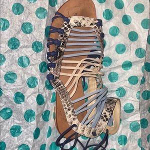 Used snake skin sandal